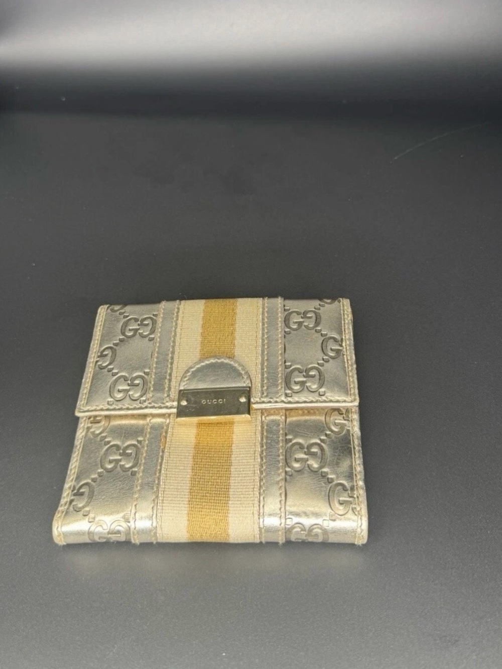 Gucci Metallic Gold GG Bifold Wallet with Yellow Center Stripe